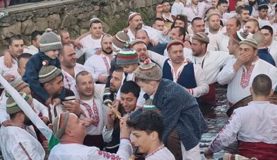 The Cross retrieved from the river during Epiphany celebrations in Kalofer was given to the youngest participant in the men’s dance